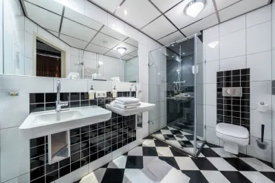 Hotel de Boegschroef - badkamer